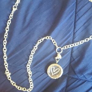 Heart locket necklace.